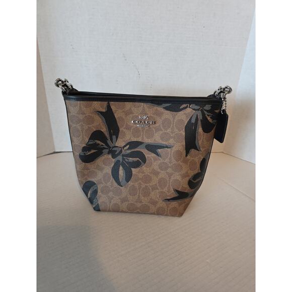 Coach Handbags - Coach City Bucket Bag In Signature‎ Canvas With Bow Print CY651 Black
